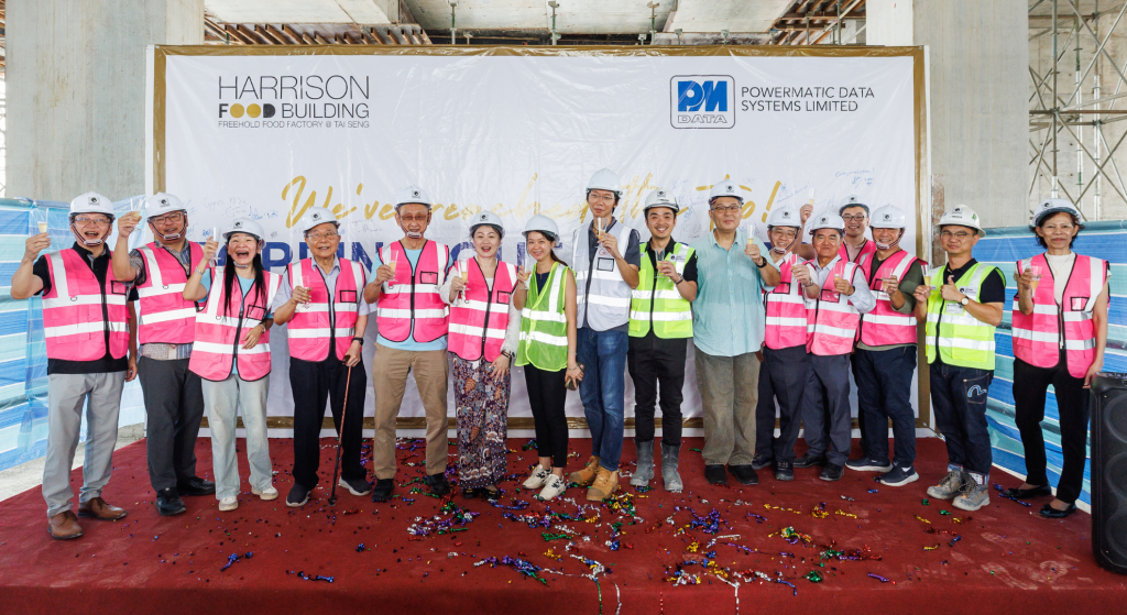 Group toast at Harrison Food Building topping-out ceremony